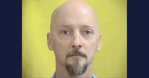 Clinton Dickens apareix en una foto policial