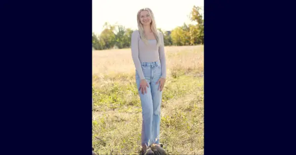 Gina Bryant står på et jorde om dagen i lykkeligere tider.