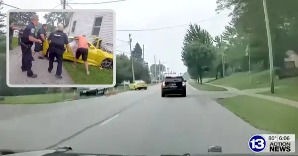 En gul Camaro kan sees svinge mot et hus i Ohio, kjølvannet av krasjet er innfelt.